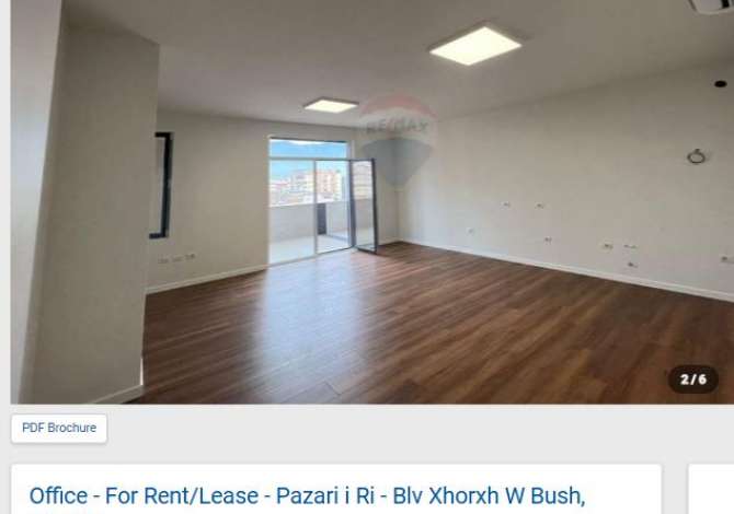 ZYRE ME QERA PERBALL TOPTANIT NE QENDER