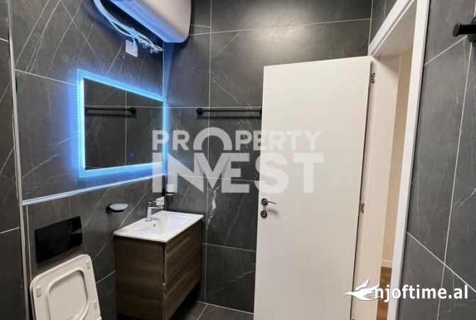 AMBIENT PER ZYRA ME QERA, TOPTANI.