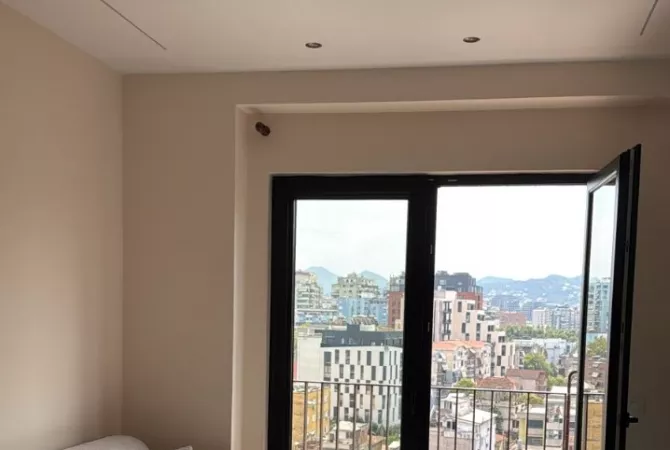 Jepet me Qera Apartament 1+1 tek Tirana Garden Building, Rruga e Kavajës. 