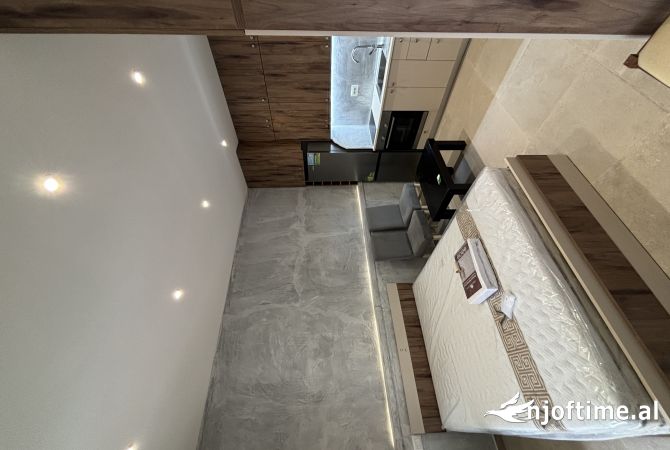 Gazonier me Qera ne Yzberisht 