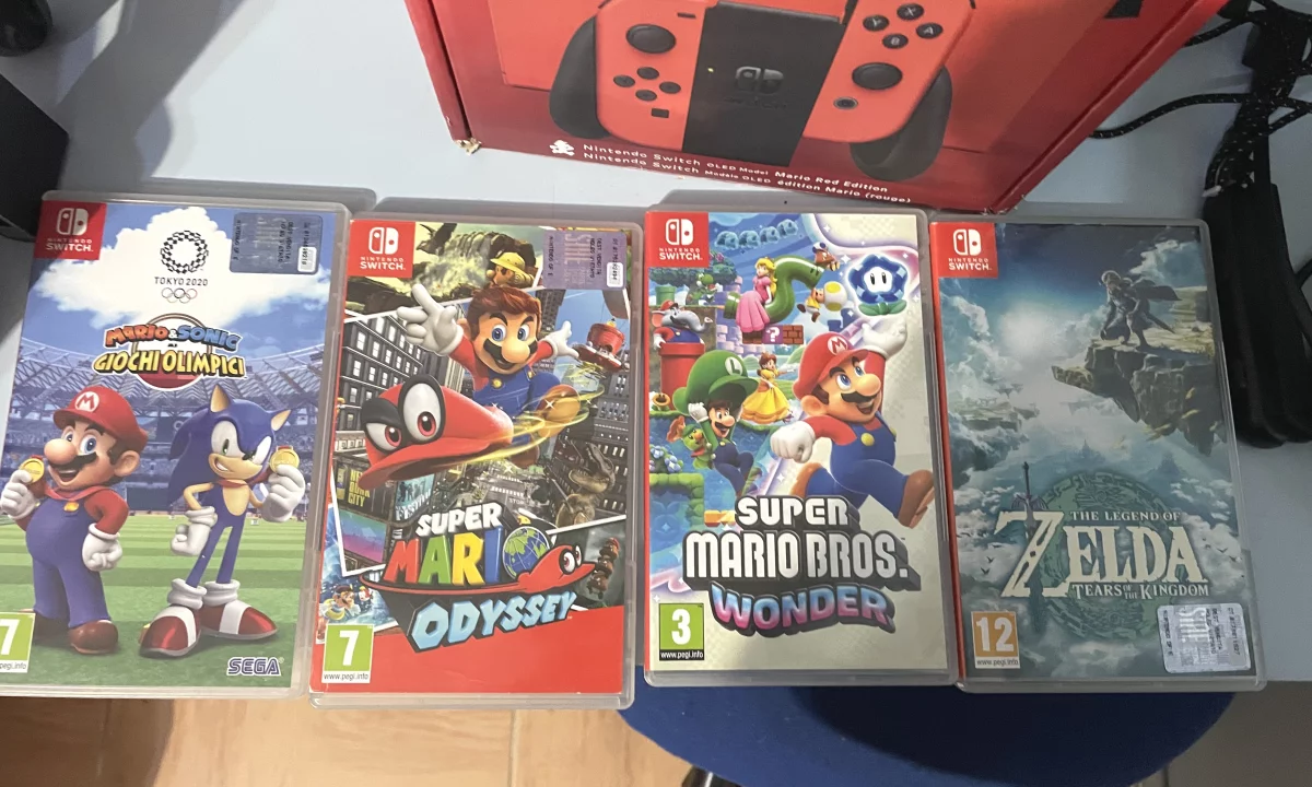 🔥 OKAZION: NINTENDO SWITCH OLED MARIO RED + CUSTODIA HEYSTOP + 4 LOJERA